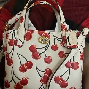 New with tags Coach purse dropped from 150 to140 for Black Friday